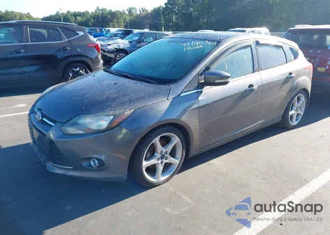 2014 Ford Focus Titanium z USA, uszkodzony, nr VIN 1FADP3N26EL190505